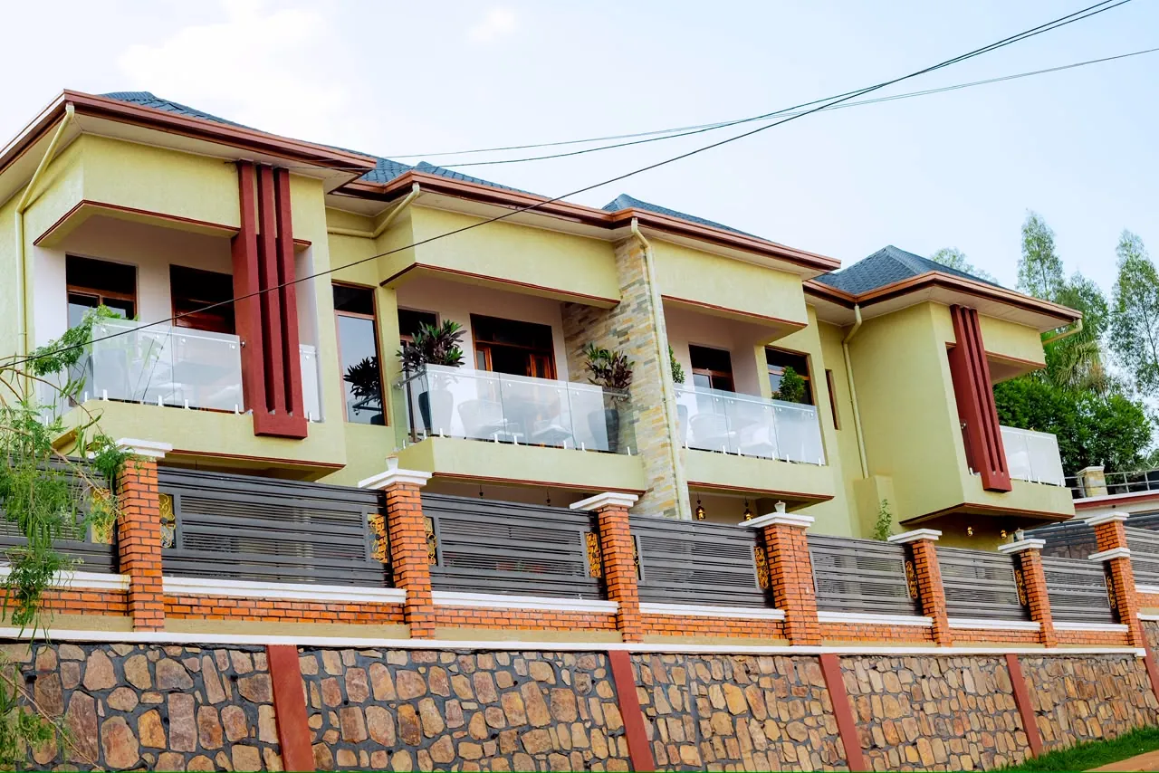 Wide view of the apartment building and its glass-fronted balconies