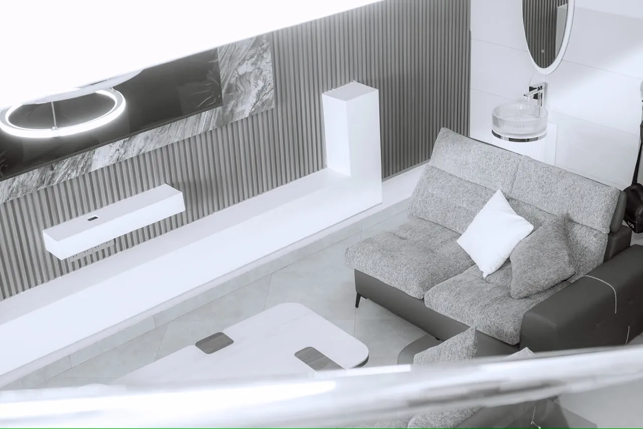 View down to the gray sofa, coffee table and wall-mounted entertainment unit