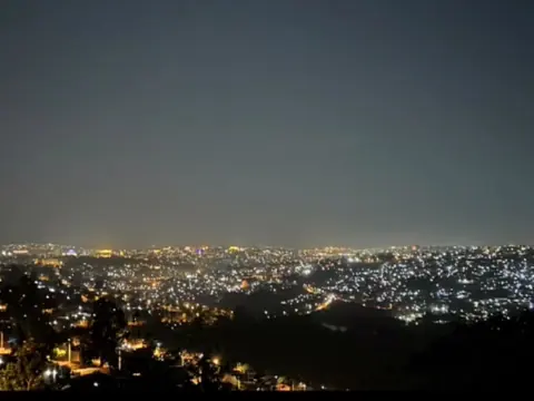 City lights across Kigali's hills at night